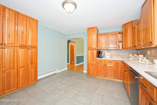 9 S Maple Ln, Colonie, NY 12211 - kitchen featuring a baseboard heating unit, dishwasher, light countertops, and tasteful backsplash