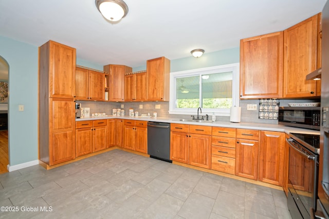 9 S Maple Ln, Colonie, NY 12211 - kitchen featuring dishwashing machine, range, stainless steel microwave, and decorative backsplash