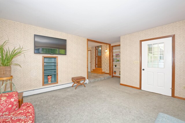 9 S Maple Ln, Colonie, NY 12211 - living area with baseboard heating, carpet floors, and baseboards