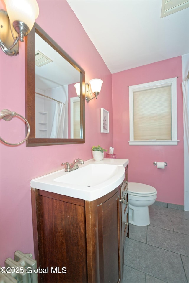 9 S Maple Ln, Colonie, NY 12211 - bathroom featuring vanity, toilet, tile patterned floors, and a shower with curtain