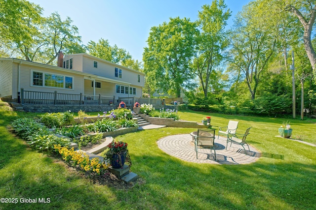 9 S Maple Ln, Colonie, NY 12211 - view of green lawn featuring a patio area