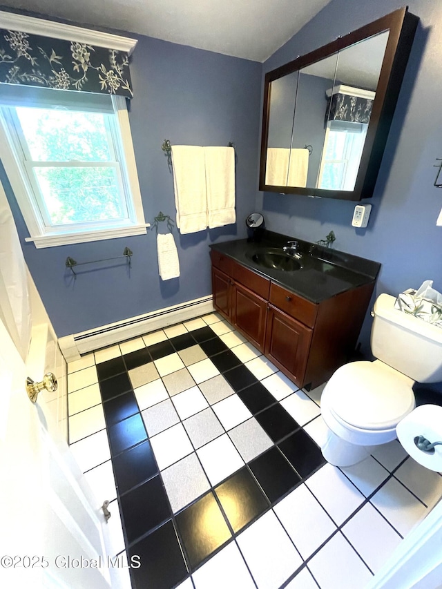 9 S Maple Ln, Colonie, NY 12211 - full bathroom with a baseboard radiator, toilet, vanity, and tile patterned flooring