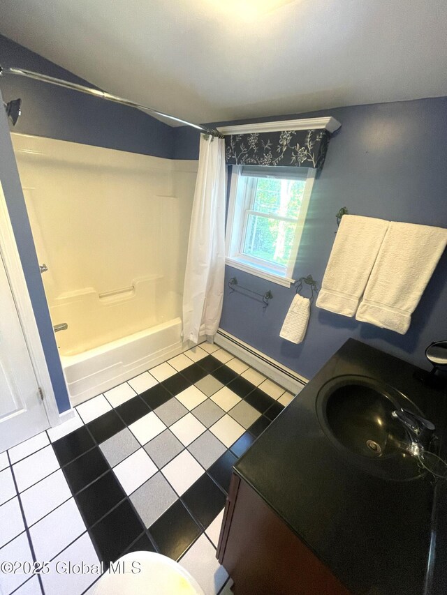 9 S Maple Ln, Colonie, NY 12211 - bathroom with a baseboard radiator, shower / tub combo, vanity, and baseboards