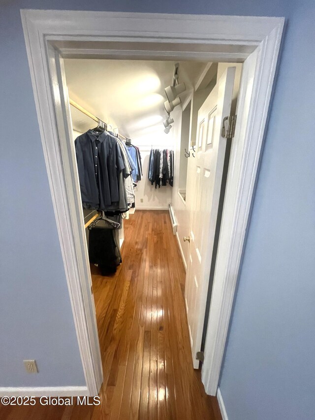 9 S Maple Ln, Colonie, NY 12211 - spacious closet with hardwood / wood-style floors and a baseboard radiator
