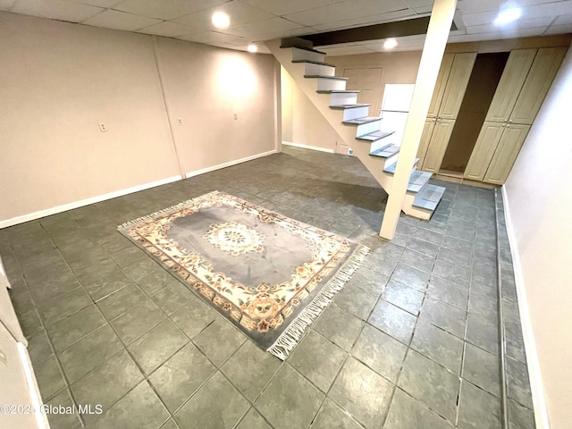 9 S Maple Ln, Colonie, NY 12211 - finished below grade area featuring a drop ceiling, baseboards, and stairway