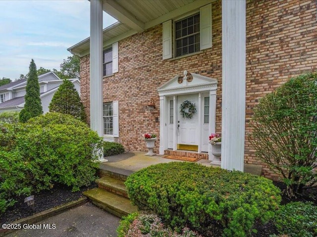 3077 New Williamsburg Dr, Guilderland, NY 12303 - view of exterior entry with brick siding