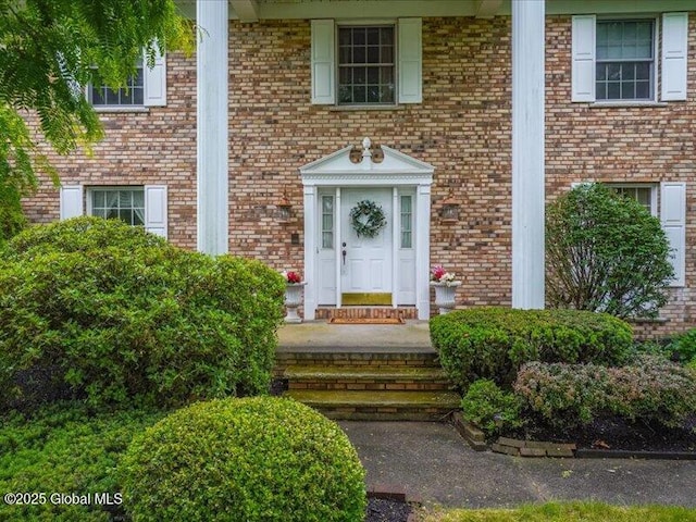 3077 New Williamsburg Dr, Guilderland, NY 12303 - doorway to property featuring brick siding