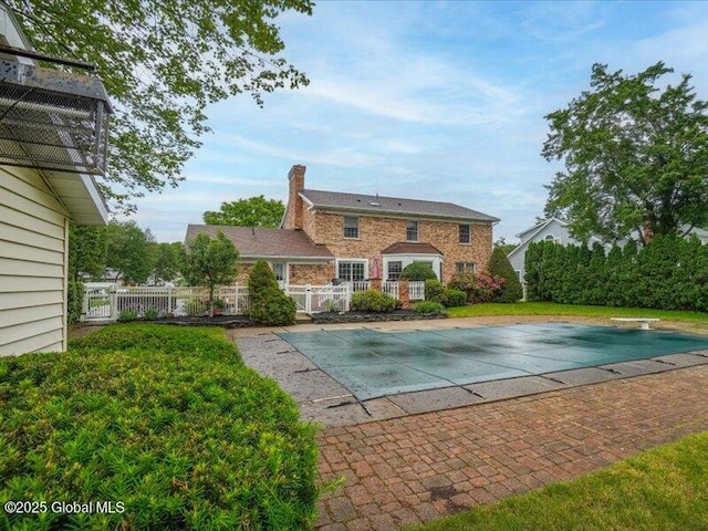 3077 New Williamsburg Dr, Guilderland, NY 12303 - view of pool featuring a diving board and a patio