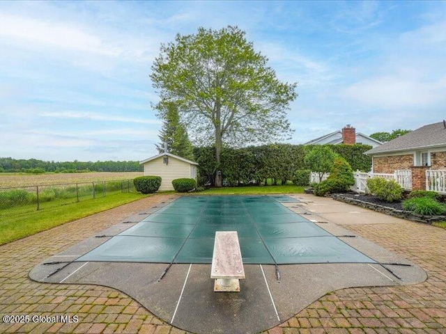 3077 New Williamsburg Dr, Guilderland, NY 12303 - view of pool with a diving board, an outdoor structure, and a patio