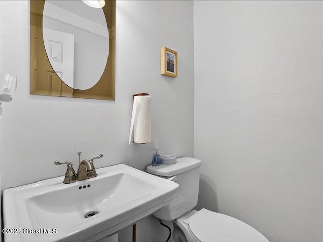 3077 New Williamsburg Dr, Guilderland, NY 12303 - bathroom with toilet and a sink