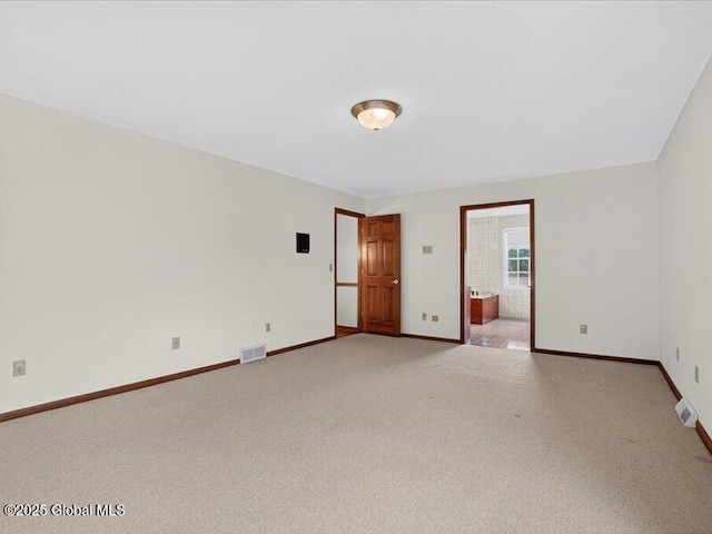3077 New Williamsburg Dr, Guilderland, NY 12303 - unfurnished room with light colored carpet and baseboards