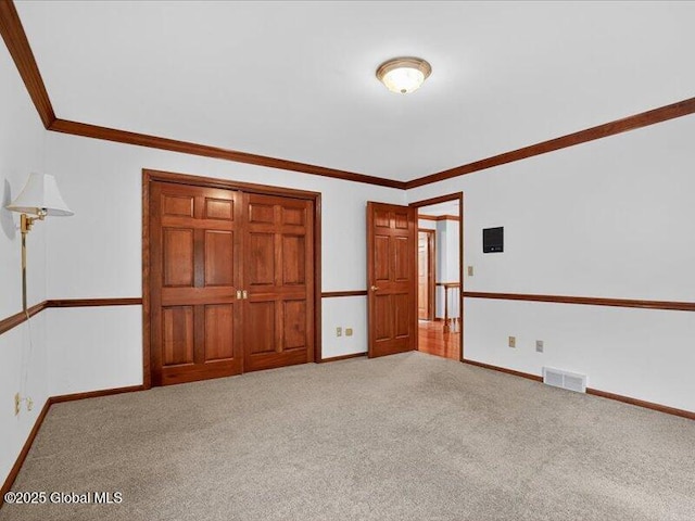 3077 New Williamsburg Dr, Guilderland, NY 12303 - unfurnished bedroom featuring carpet floors and crown molding