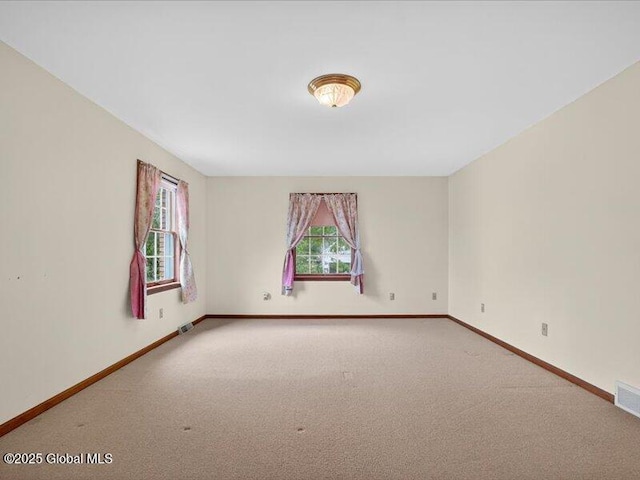 3077 New Williamsburg Dr, Guilderland, NY 12303 - spare room featuring plenty of natural light and carpet floors