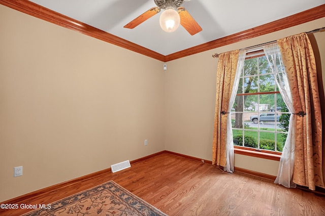 3077 New Williamsburg Dr, Guilderland, NY 12303 - empty room featuring crown molding, wood finished floors, and ceiling fan