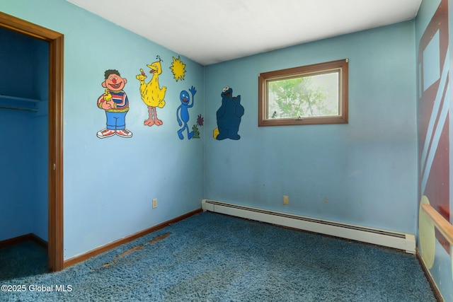 195 N St, Cobleskill, NY 12043 - unfurnished bedroom featuring a baseboard heating unit, carpet floors, and baseboards