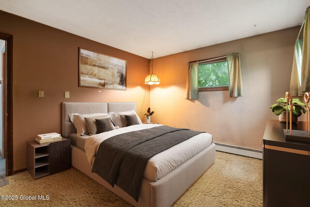 195 N St, Cobleskill, NY 12043 - carpeted bedroom featuring a baseboard heating unit