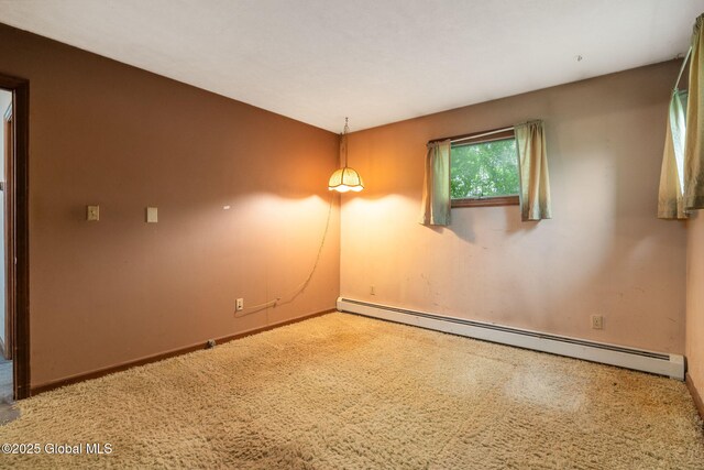 195 N St, Cobleskill, NY 12043 - carpeted spare room featuring a baseboard radiator and baseboards
