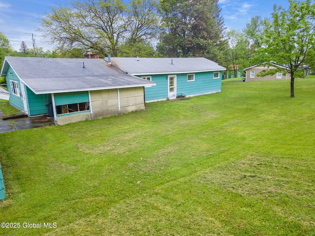 195 N St, Cobleskill, NY 12043 - rear view of house featuring a yard