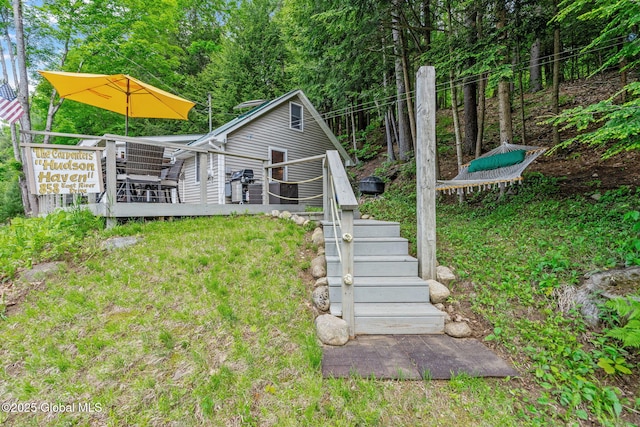 858 E River Dr, Lake Luzerne, NY 12846 - view of yard with a wooden deck and stairway