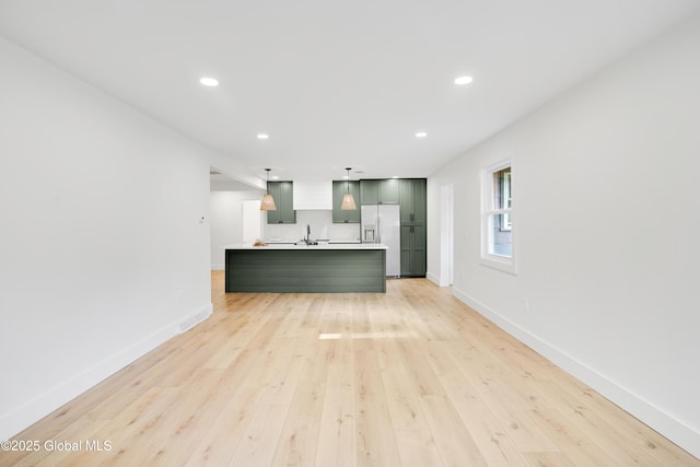 106 E Berkley Sq, Glenville, NY 12302 - unfurnished living room featuring recessed lighting and light wood-style flooring