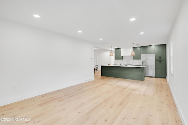 106 E Berkley Sq, Glenville, NY 12302 - unfurnished living room featuring light wood-type flooring and recessed lighting