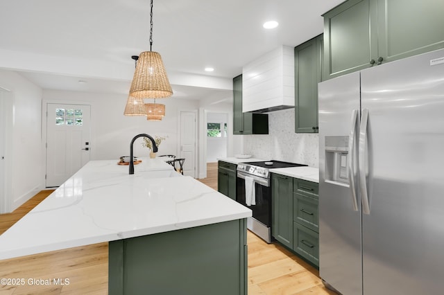 106 E Berkley Sq, Glenville, NY 12302 - kitchen featuring green cabinets, appliances with stainless steel finishes, custom range hood, a spacious island, and backsplash