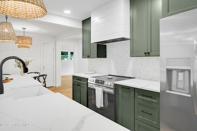 106 E Berkley Sq, Glenville, NY 12302 - kitchen featuring green cabinets, stainless steel appliances, custom exhaust hood, decorative backsplash, and recessed lighting