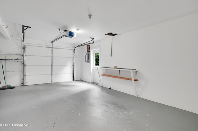 106 E Berkley Sq, Glenville, NY 12302 - garage featuring electric panel and a garage door opener
