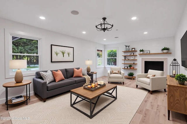 106 E Berkley Sq, Glenville, NY 12302 - living room featuring light wood-style flooring, a chandelier, and recessed lighting