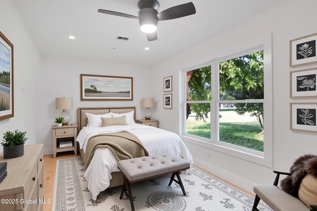 106 E Berkley Sq, Glenville, NY 12302 - bedroom with light wood finished floors, multiple windows, recessed lighting, and ceiling fan