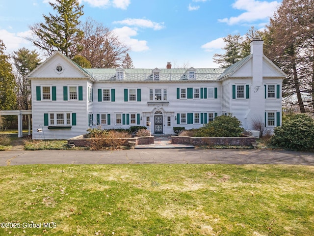 2125 Rosendale Rd, Niskayuna, NY 12309 - view of front of property with a chimney and a front yard