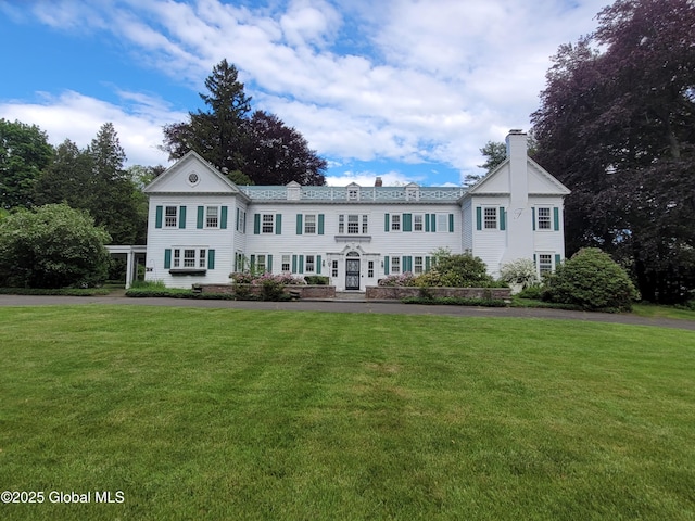 2125 Rosendale Rd, Niskayuna, NY 12309 - view of front facade featuring a chimney and a front lawn