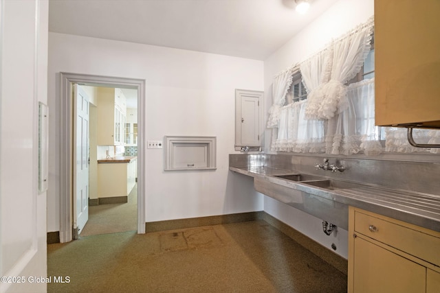 2125 Rosendale Rd, Niskayuna, NY 12309 - kitchen with stainless steel counters, healthy amount of natural light, carpet, and baseboards