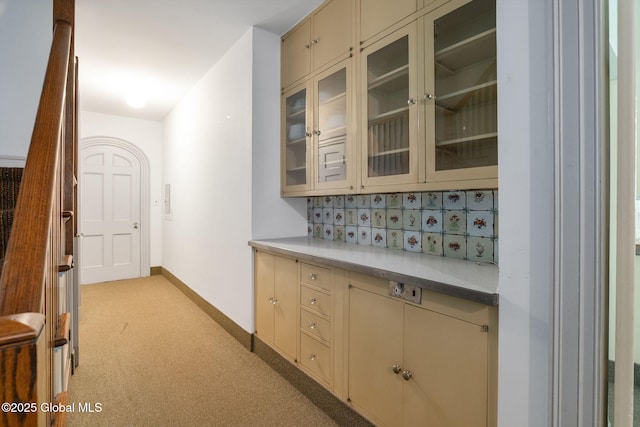 2125 Rosendale Rd, Niskayuna, NY 12309 - bar with light carpet, baseboards, and backsplash
