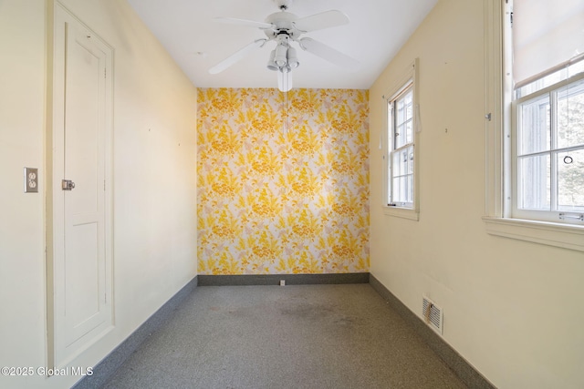 2125 Rosendale Rd, Niskayuna, NY 12309 - unfurnished room with wallpapered walls, healthy amount of natural light, carpet, ceiling fan, and baseboards