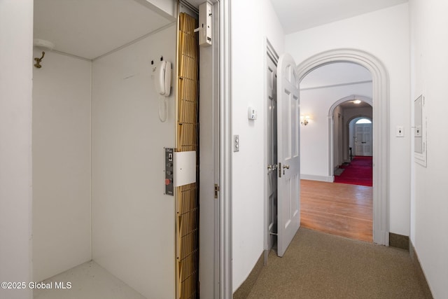 2125 Rosendale Rd, Niskayuna, NY 12309 - corridor with arched walkways and carpet flooring