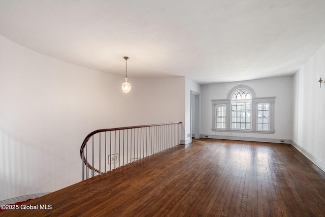 2125 Rosendale Rd, Niskayuna, NY 12309 - spare room featuring hardwood / wood-style floors and baseboards