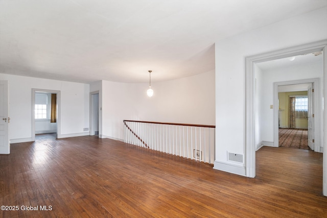 2125 Rosendale Rd, Niskayuna, NY 12309 - unfurnished room featuring dark wood-style flooring and baseboards