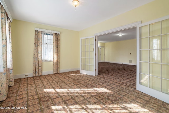 2125 Rosendale Rd, Niskayuna, NY 12309 - carpeted empty room featuring french doors and baseboards