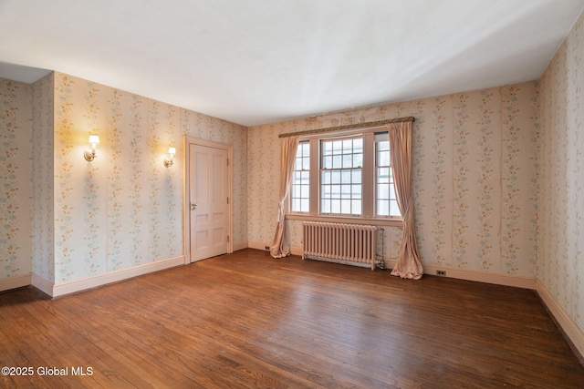 2125 Rosendale Rd, Niskayuna, NY 12309 - empty room with radiator, wood finished floors, baseboards, and wallpapered walls