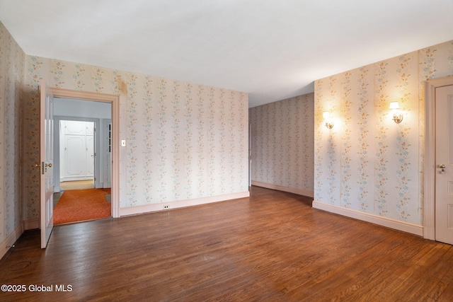 2125 Rosendale Rd, Niskayuna, NY 12309 - empty room featuring wood finished floors, wallpapered walls, and baseboards