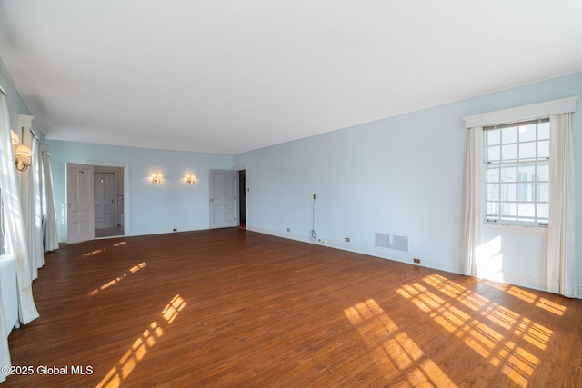 2125 Rosendale Rd, Niskayuna, NY 12309 - unfurnished living room with wood finished floors and baseboards