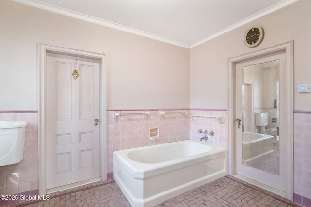 2125 Rosendale Rd, Niskayuna, NY 12309 - full bath featuring tile walls, wainscoting, a bath, tile patterned flooring, and crown molding