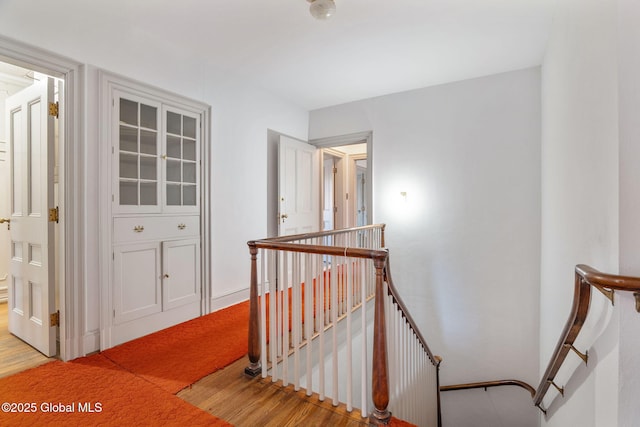 2125 Rosendale Rd, Niskayuna, NY 12309 - stairway featuring wood finished floors