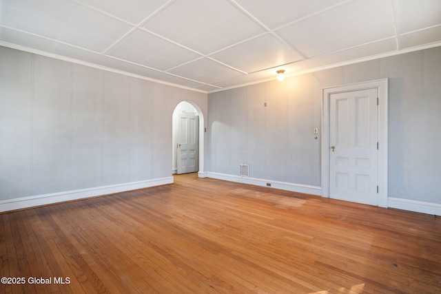 2125 Rosendale Rd, Niskayuna, NY 12309 - unfurnished room featuring arched walkways, wood finished floors, baseboards, and crown molding