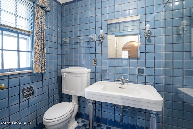 2125 Rosendale Rd, Niskayuna, NY 12309 - bathroom featuring tile walls and toilet