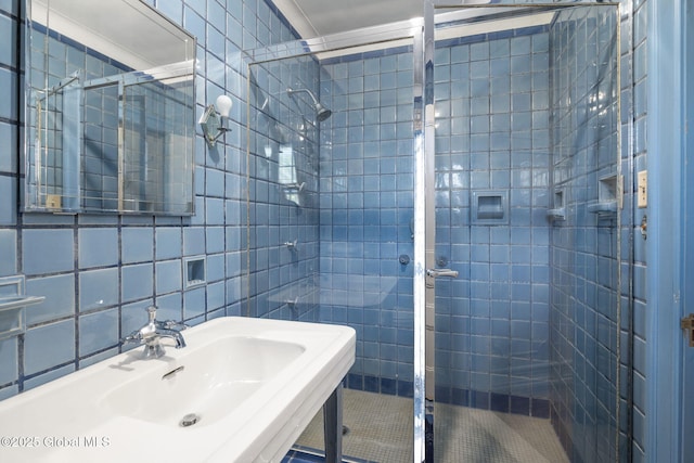 2125 Rosendale Rd, Niskayuna, NY 12309 - bathroom featuring a shower stall, tile walls, and a sink