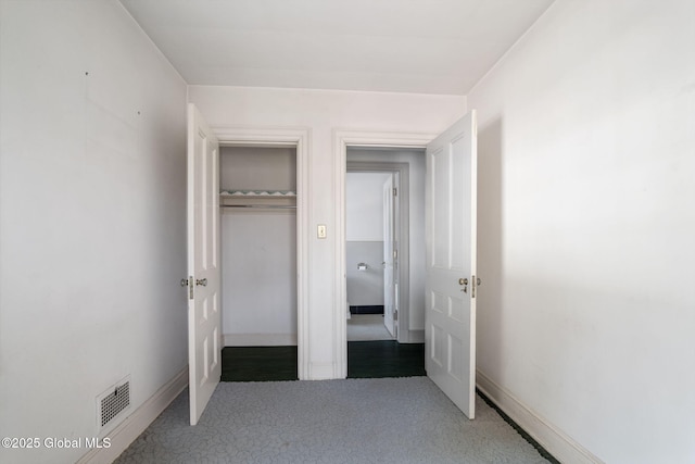 2125 Rosendale Rd, Niskayuna, NY 12309 - unfurnished bedroom featuring carpet flooring, a closet, and baseboards