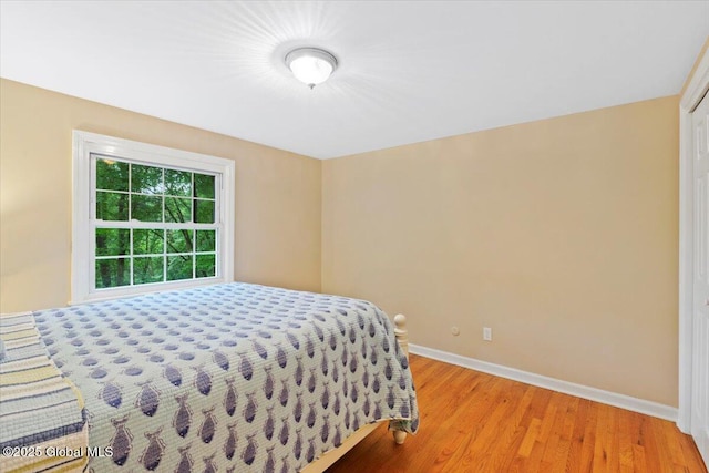 19 Canterbury Rd, Clifton Park, NY 12065 - bedroom featuring baseboards and light wood-style floors