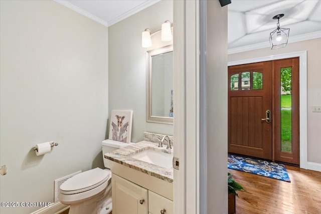 19 Canterbury Rd, Clifton Park, NY 12065 - bathroom with vanity, wood finished floors, and crown molding